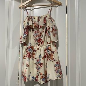 Floral romper. Cold shoulder. Spaghetti strap. Worn once.